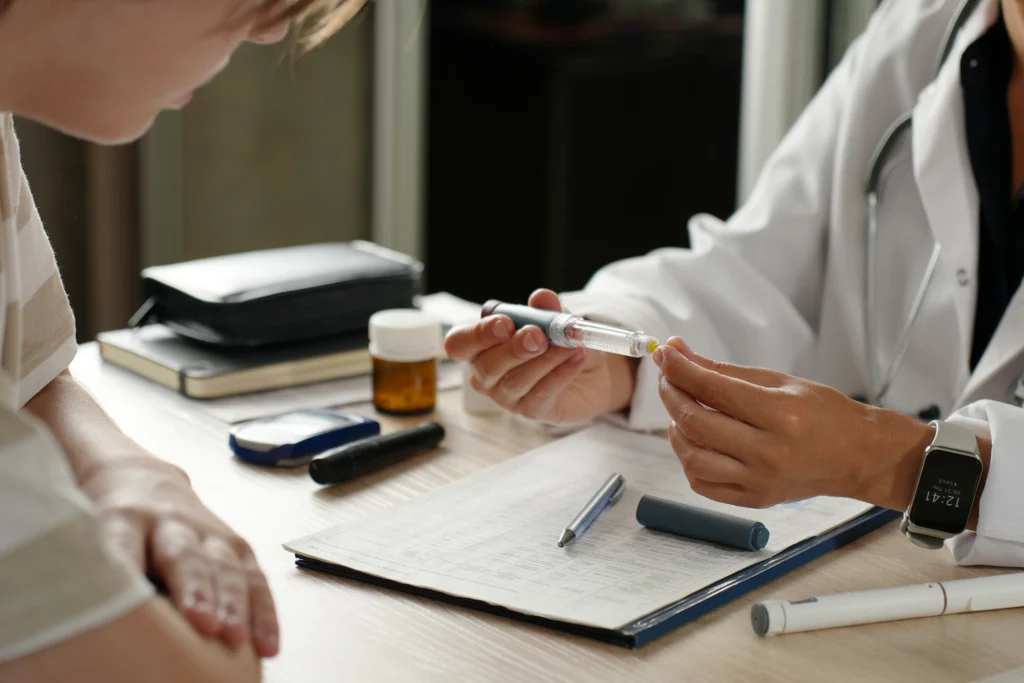 Image of doctor hands at desk