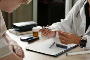 Image of doctor hands at desk